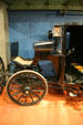 Brougham carriage with arched area under drivers seat to allow tight turns in cities at El Pomar Carriage Museum. Colorado Springs, CO.