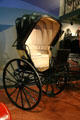 Hooded Gig by Windover & Co., London, has two wheels & drawn by one horse at El Pomar Carriage Museum. Colorado Springs, CO.