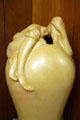 Ceramic woman draped over vase by Van Briggle Pottery. Colorado Springs, CO