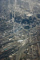 Downtown Denver from the air with rail yards in foreground. Denver, CO.