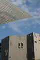 Contrasting textures & shapes of Hamilton & North wings of Denver Art Museum. Denver, CO.