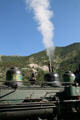 Steam from whistle of Georgetown Loop Railroad steam locomotive. Silver Plume, CO.