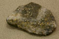 Gold flecks in ore rock at Argo Gold Mine & Mill. Idaho Springs, CO.
