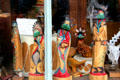 Hand carved Hopi Kachina dolls in shop window on Greene St. Silverton, CO.