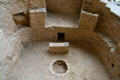 Kiva detail with fire pit, air deflector wall, ventilator chimney hole plus benches for ceremony attendees at Cliff Palace in Mesa Verde National Park. CO.