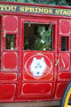 Wolf painted on door of Manitou Springs Stage Line concord stagecoach. Manitou Springs, CO.