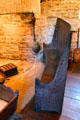 Pine settle curved for stability & designed to trap heat around sitters at Henry Whitfield State Museum. Guilford, CT.