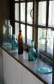 Glass medicine bottles at Dr. Hezekiah Chaffee House. Windsor, CT.