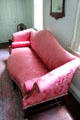 Settee with red upholstery owned by Oliver Ellsworth at his Homestead Museum. Windsor, CT.