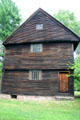 Gable end of Buttolph-Williams House with leaded windows & weathered boards. Wethersfield, CT