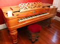 Square grand piano made from wood of Connecticut's historic Charter Oak at Deep River Museum. Deep River, CT.