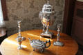Silver water urn, teapot & candlesticks at Denison Homestead Museum. Stonington, CT.