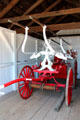 Horse-drawn fire pumper at Mystic Seaport. Mystic, CT.