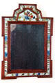 Early American mirror with painted glass on frame at Nathaniel Hempstead House. New London, CT.