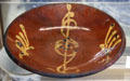 Connecticut-style redware plate at Monument House Museum. Groton, CT.