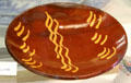 Connecticut-style redware plate at Monument House Museum. Groton, CT.