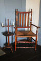 Caned armchair with adjustable-height candle stand at Judson House. Stratford, CT