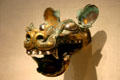 Bronze, silver, gold chariot fitting in canine shape from China in Sackler Gallery. Washington, DC.