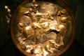 Gilt-silver plate showing horseman hunting boars from Persia in Sackler Gallery. Washington, DC.