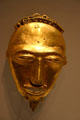 Gold pendant of African face from Ivory Coast in National Museum of African Art. Washington, DC.