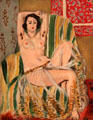 Odalisque Seated with Arms Raised, Green Striped Chair painting by Henri Matisse at National Gallery of Art. Washington, DC.