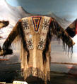 Lakota fringed leather shirt with beadwork at National Museum of the American Indian. Washington, DC.