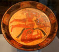 Late Classic Mayan ceramic polychrome tripod plate painted with figure with headdress from Mexico at Dumbarton Oaks Museum. Washington, DC.