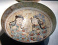 Enameled earthenware bowl with couple from Iran at Smithsonian Freer Gallery of Art. Washington, DC.