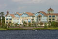 Residential buildings beside Downtown Disney Village Lake. Disney World, FL.