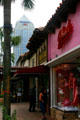 Shops of early Fort Lauderdale on East Las Olas Blvd. with Bank of America Plaza beyond. Fort Lauderdale, FL.