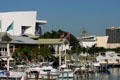 American Airlines Arena seen beyond boats docked along Bayside Market. Miami, FL.