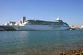 Majesty of the Seas cruise ship against skyline of Miami. Miami, FL.