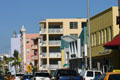 Brightly-painted buildings of Collins Avenue north of 5th Street. Miami Beach, FL.