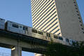 Miami Metrorail train weaves through highrises. Miami, FL