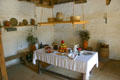 Interior of Spanish house with swinging shelves to alert residents to vermin at San Luis Historic Site. Tallahassee, FL.