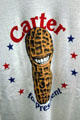 Smiling peanut on T-shirt boosts Carter for President in Jimmy Carter Presidential Museum. Atlanta, GA