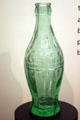 First Coke bottles bulged more than modern bottles at Coca-Cola Museum. Atlanta, GA.