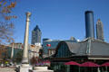 Centennial Olympic Park visitor center with Atlanta's skyline. Atlanta, GA.