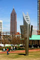 Androgyne Planet sculpture by Enric Pladevall in Centennial Olympic Park with Bank of America tower beyond. Atlanta, GA.