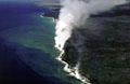 Steam where hot lava meets sea from air in Volcanoes National Park. Big Island of Hawaii, HI.