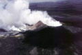Aerial view of smoking volcano over Volcanoes National Park. Big Island of Hawaii, HI.