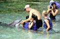 Children learn about dolphins at Hilton Waikoloa Village, Kona coast. Big Island of Hawaii, HI.