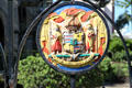 Royal seal on gate of tomb of King William Charles Lunalilo beside Kawaiaha'o Church. Honolulu, HI.