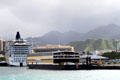 Matson ferry boat & Pride of America in Honolulu harbor. Honolulu, HI.