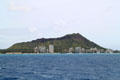 Diamond Head over buildings east of Kapi''olani Park. Waikiki, HI.