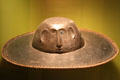 Philippine wood carved hat with face from Northern Luzon at Honolulu Academy of Arts. Honolulu, HI.