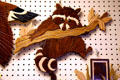 Wooden raccoon wall decoration at Schanz Furniture Shop. South Amana, IA.