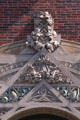 Terra cotta decoration above rose window of Merchants' National Bank. Grinnell, IA.