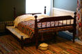 Rope bed with trundle bed contemporary with Hoover's childhood. West Branch, IA.
