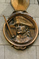 Bronze Minuteman medallion on Old Republic Building. Chicago, IL.